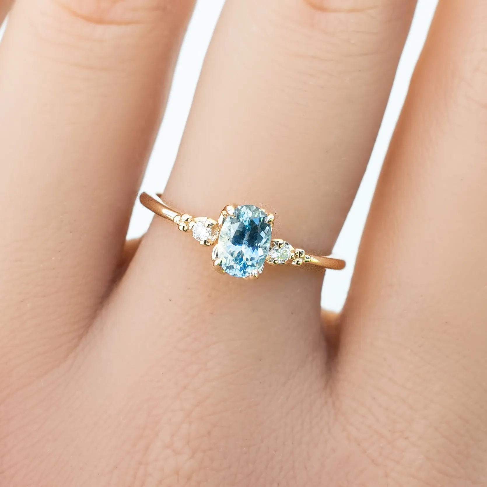 Estel Ring 6.5mm Oval Light Blue Montana Sapphire 14K Yellow Gold