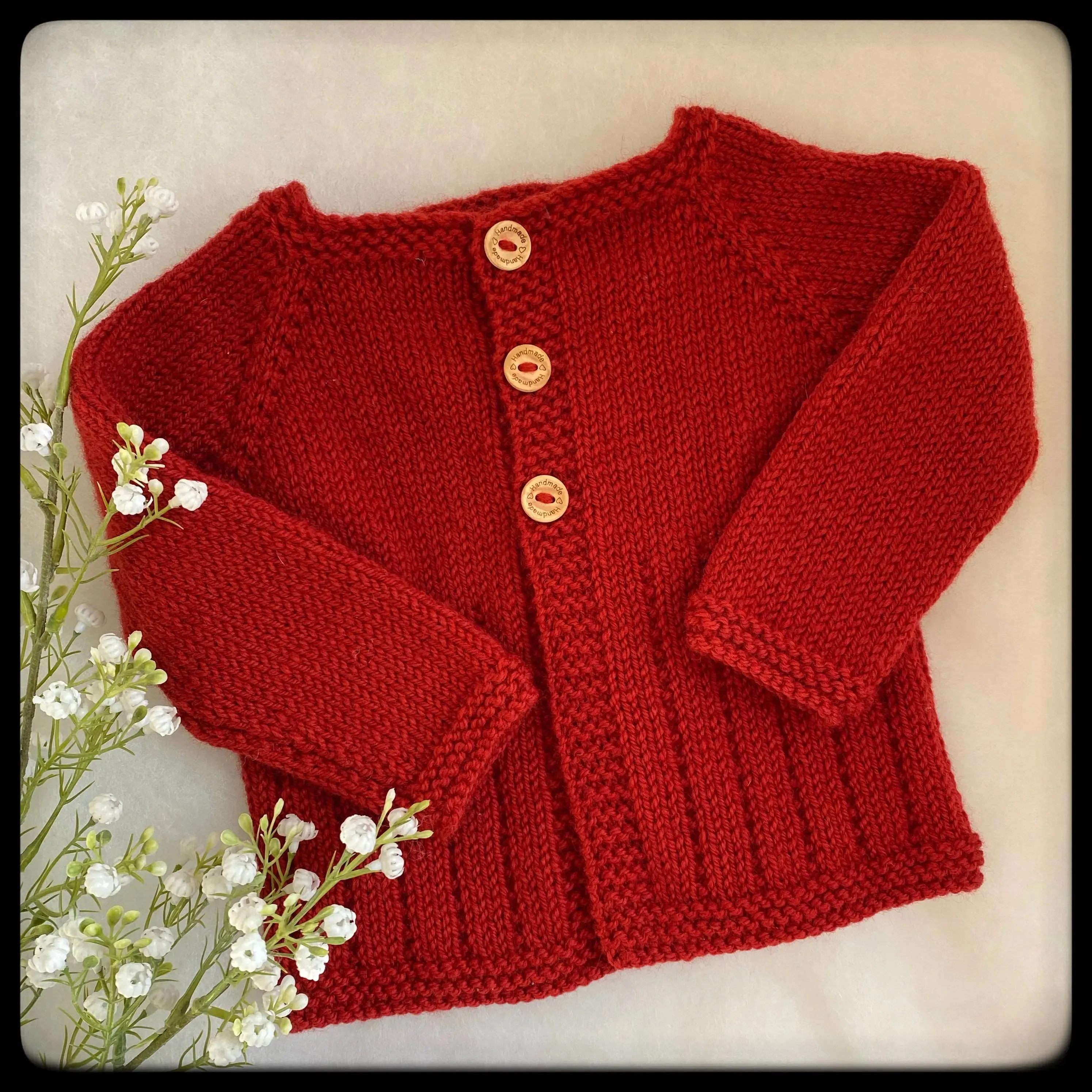 "JJ" patterned baby merino cardigan